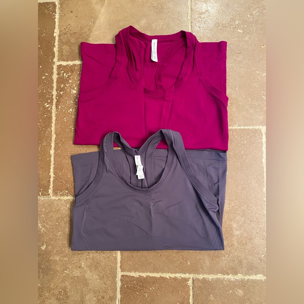 Athleta Tanks Size L. Sold as a set. Gently worn.
